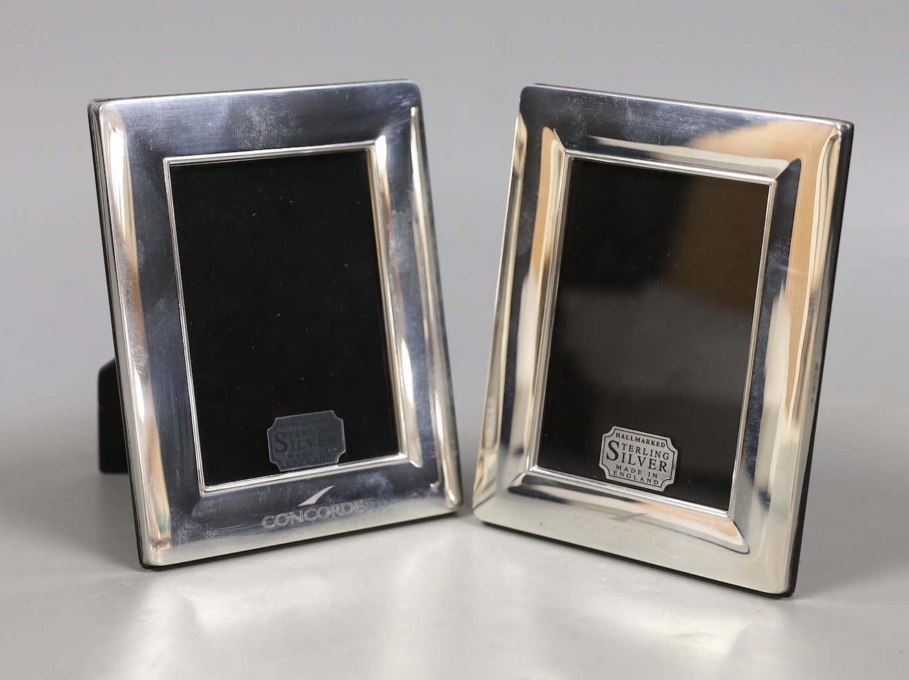Two modern silver mounted 'Concorde' commemorative photograph frames, 11.9cm, in original boxes.
